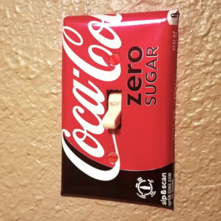 Soda can light switch cover